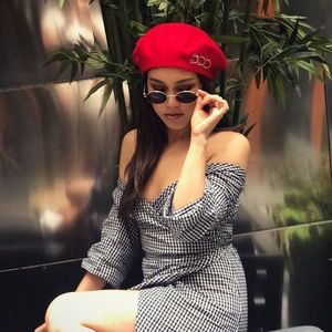 Red beret with rings